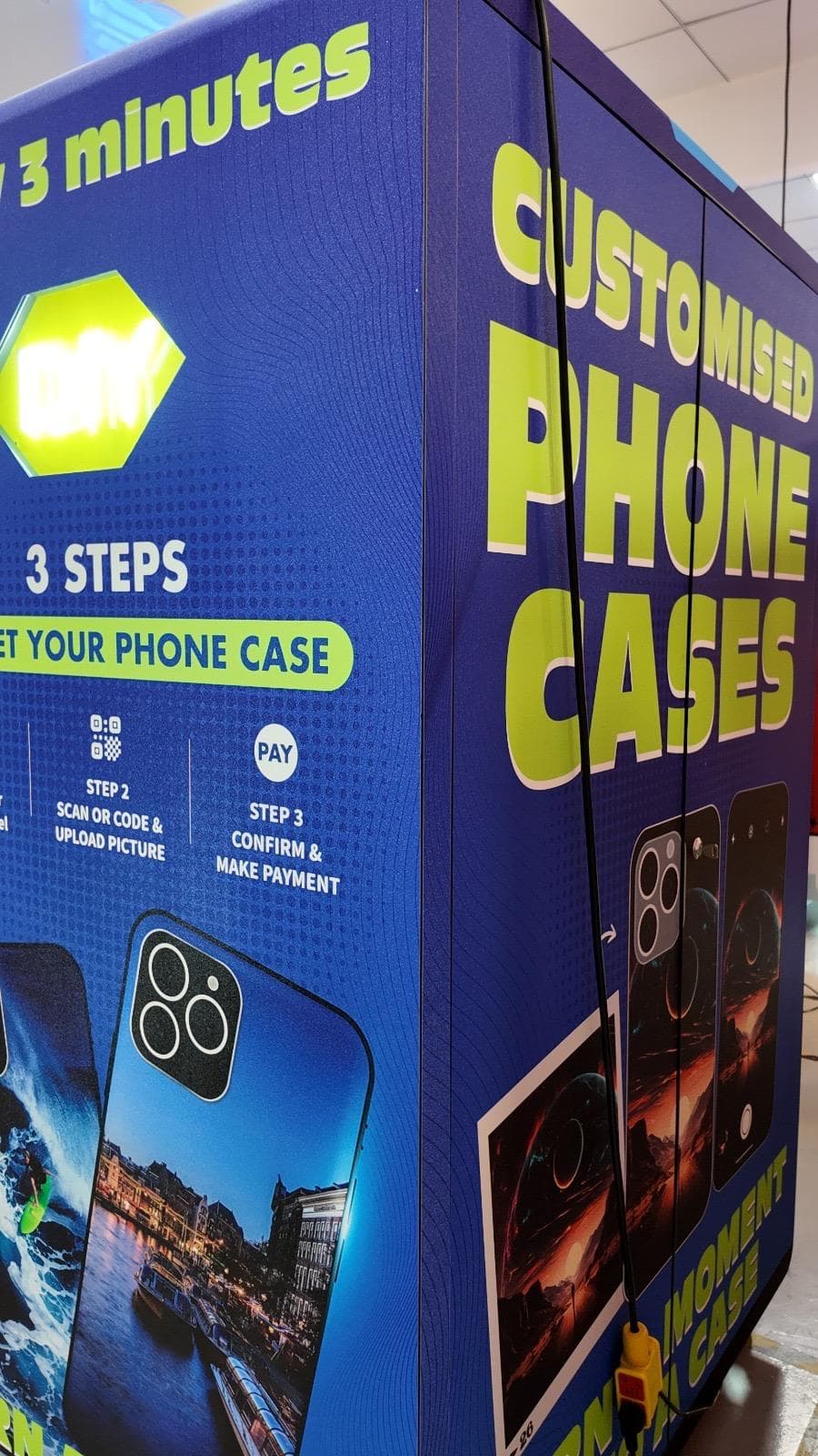 Captured Cases kiosk artwork displaying customised phone case examples